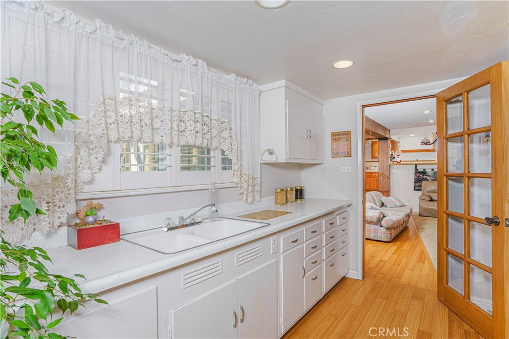 150 Pinal Avenue Santa Maria, CA 93455 - Photo 21 of 36 a spacious bathroom with a granite countertop sink a mirror and shower