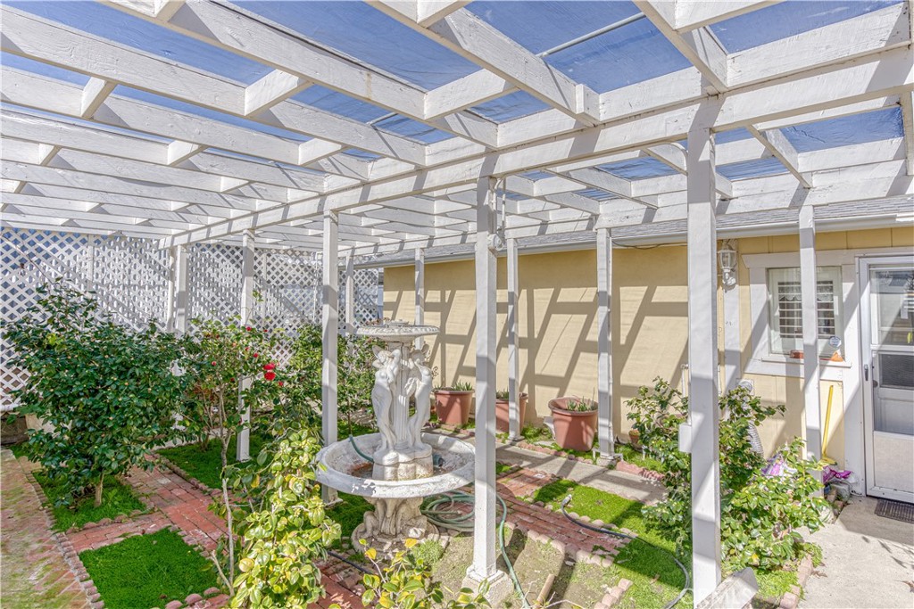 150 Pinal Avenue Santa Maria, CA 93455 - Photo 32 of 36 a view of a chairs and table in a patio