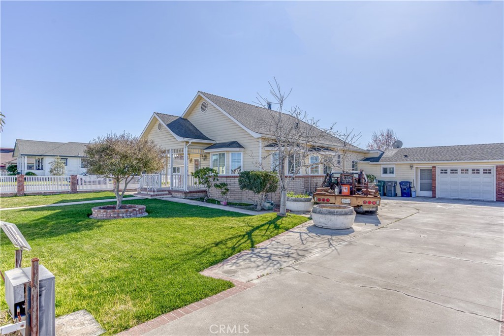 150 Pinal Avenue Santa Maria, CA 93455 - Photo 5 of 36 a view of a house with garden and a patio