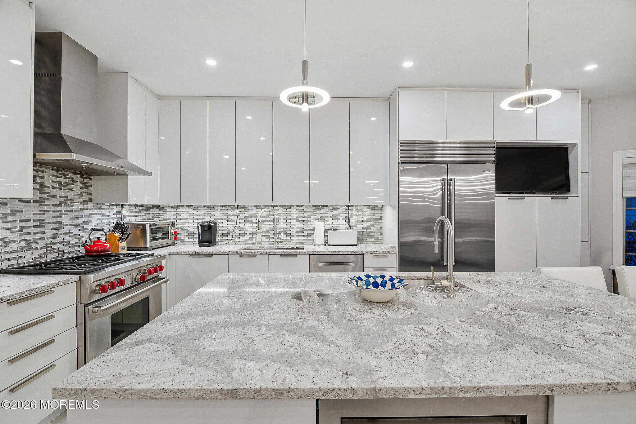 17 Riviera Drive Long Branch, NJ 07740 - Photo 23 of 46 a kitchen with stainless steel appliances granite countertop a sink a stove and a refrigerator