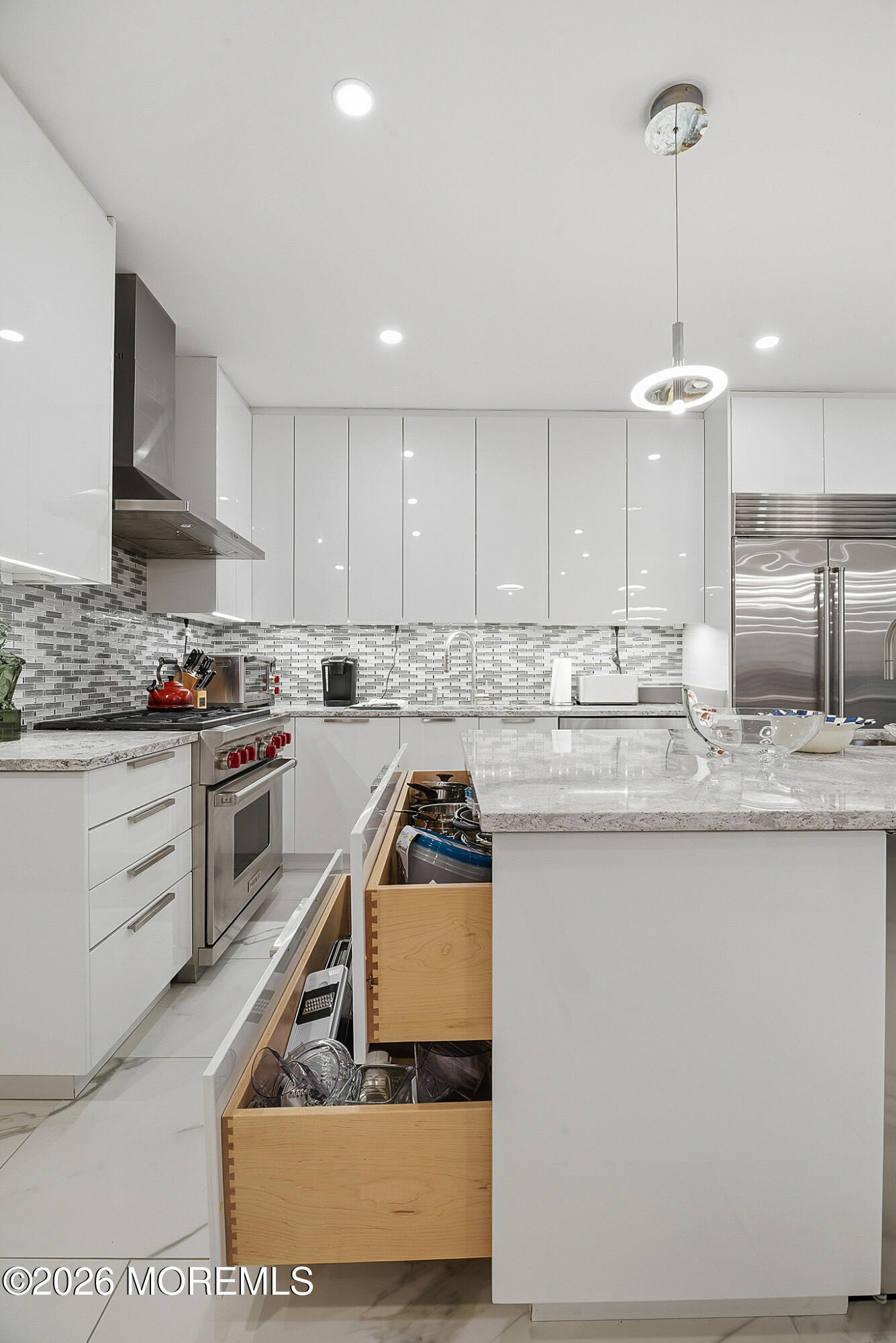 17 Riviera Drive Long Branch, NJ 07740 - Photo 26 of 46 a kitchen with granite countertop a sink cabinets and stainless steel appliances