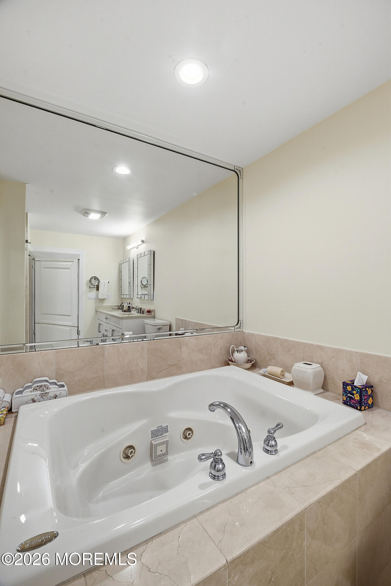 17 Riviera Drive Long Branch, NJ 07740 - Photo 32 of 46 a bathroom with a tub sink and mirror