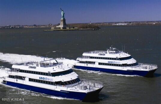 17 Riviera Drive Long Branch, NJ 07740 - Photo 43 of 46 a view of a lake with a large mountain