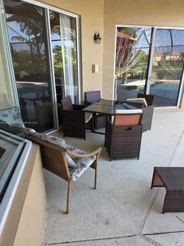 a stove top oven sitting inside of a kitchen