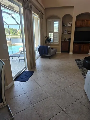 a living room with furniture and a couch