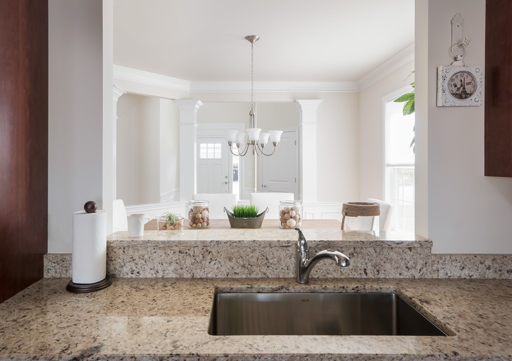 81 Monroe Drive, Unit 16 Holliston, MA 01746 - Photo 14 of 30 a kitchen with a sink and a granite counter tops