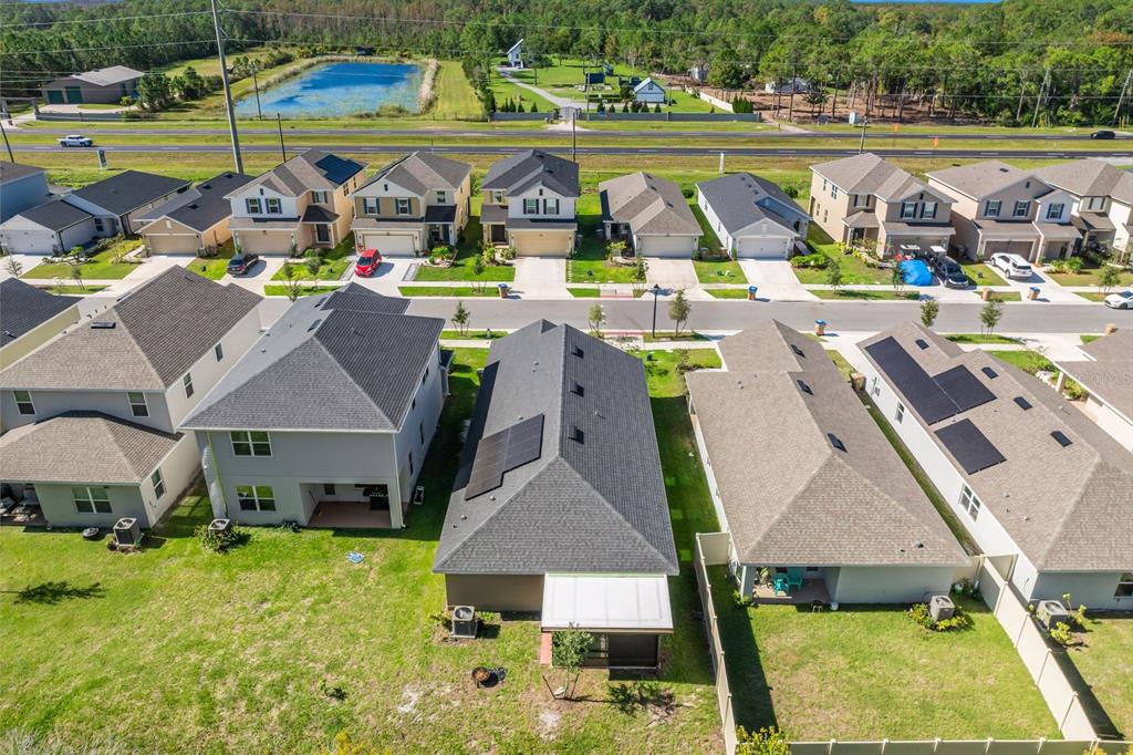 3711 Sagefield Drive Harmony, FL 34773 - Photo 23 of 24 an aerial view of a house with garden space and street view