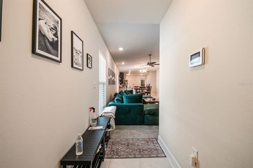 3711 Sagefield Drive Harmony, FL 34773 - Photo 4 of 24 a bathroom with a sink a mirror and a toilet