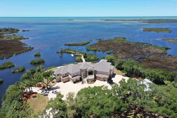 an aerial view of a house with a garden