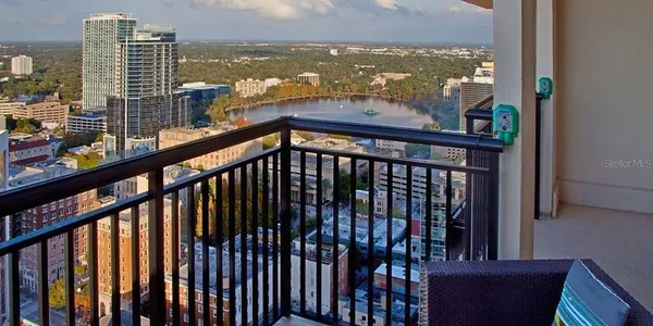 a view of a balcony with city