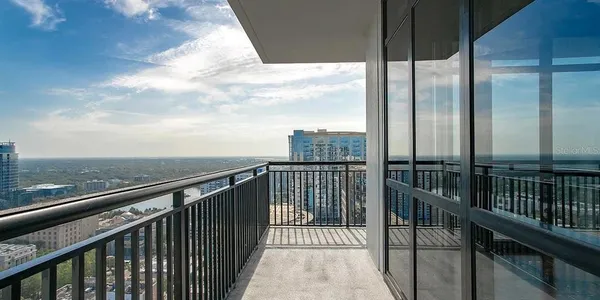 a view of a balcony with city view