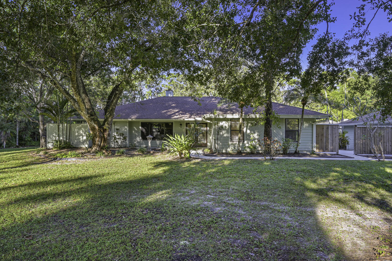 a view of a house with a yard porch and sitting area