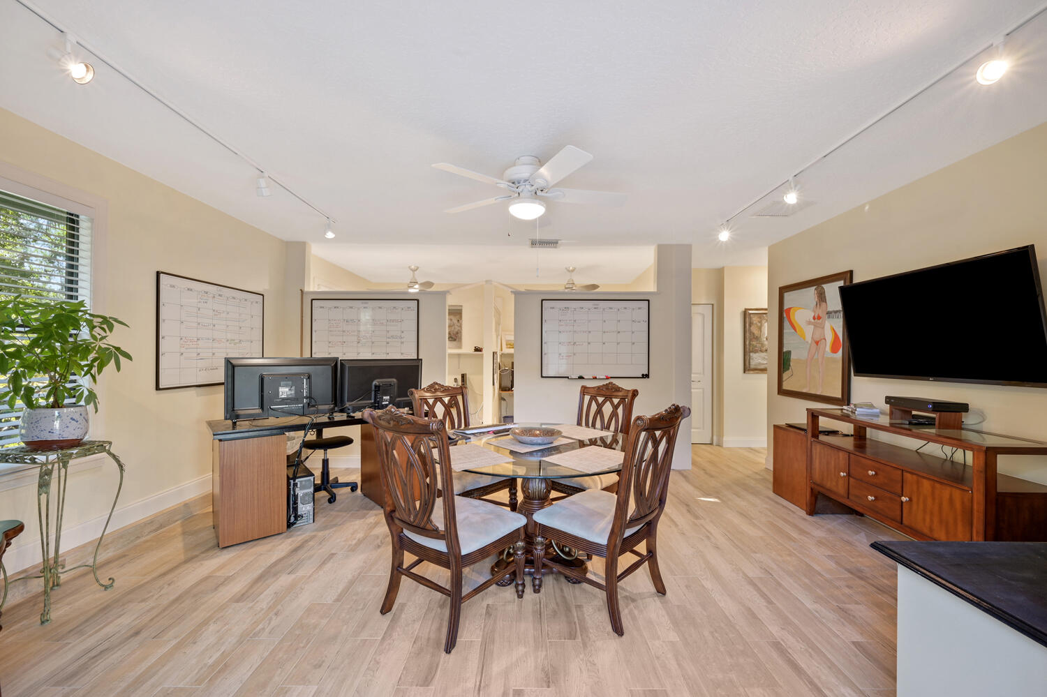 16219 134th Terrace North Jupiter, FL 33478 - Photo 20 of 40 a view of a dining room with furniture window and wooden floor