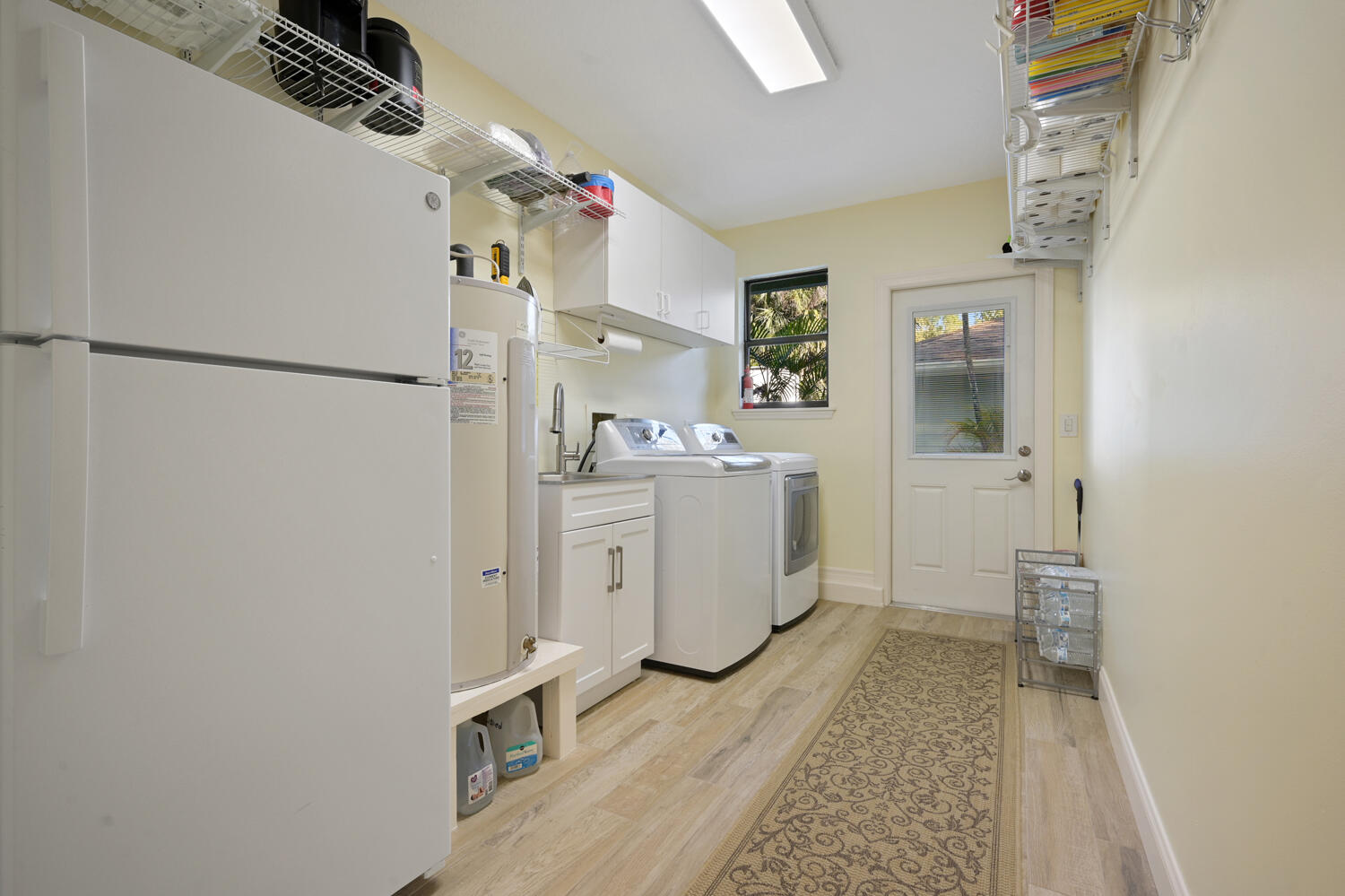 16219 134th Terrace North Jupiter, FL 33478 - Photo 23 of 40 a bathroom with a sink a toilet and shower