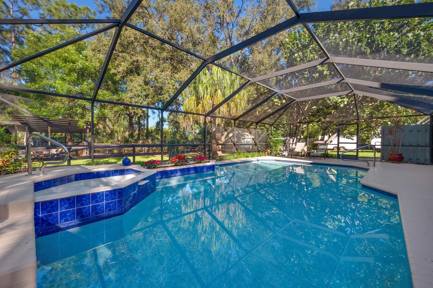 16219 134th Terrace North Jupiter, FL 33478 - Photo 27 of 40 a view of yard from a balcony
