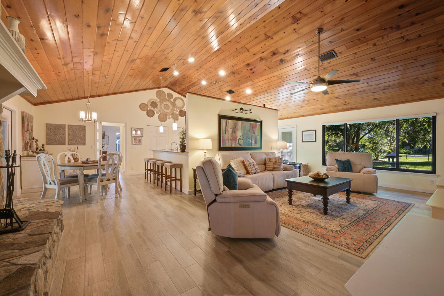 16219 134th Terrace North Jupiter, FL 33478 - Photo 8 of 40 a living room with furniture and a large window