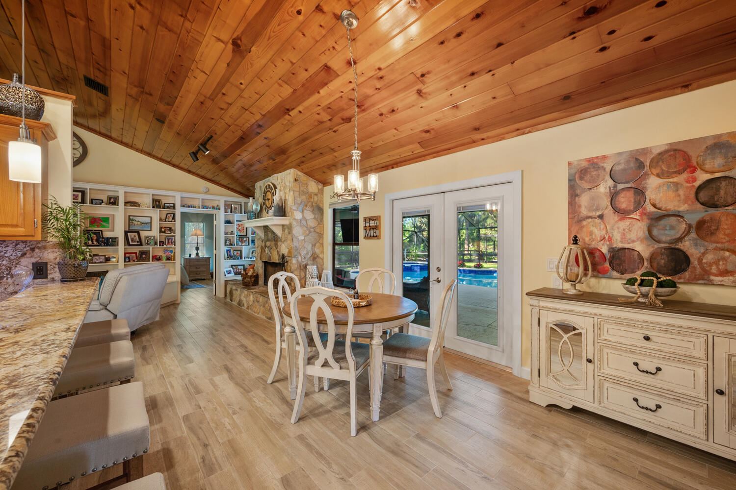 16219 134th Terrace North Jupiter, FL 33478 - Photo 10 of 40 a view of a dining room with furniture window and wooden floor