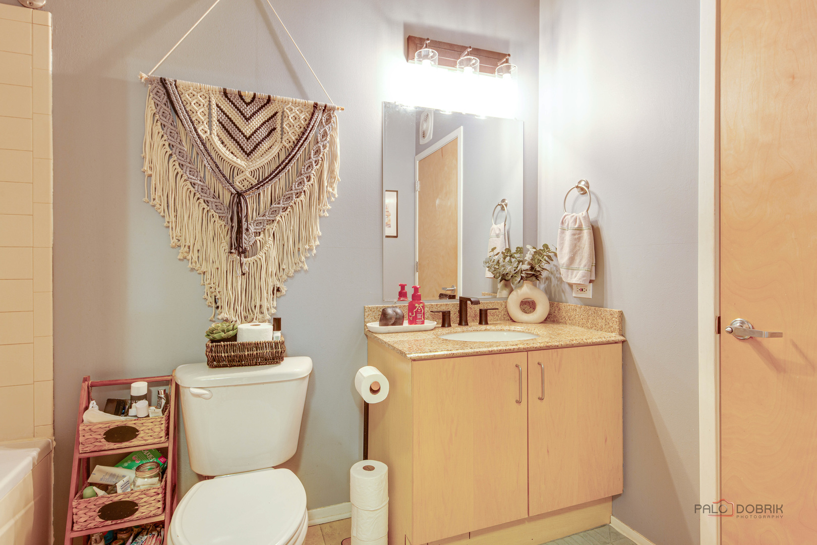 700 West Van Buren Street, Unit 1402 Chicago, IL 60607 - Photo 11 of 15 a bathroom with a toilet sink and mirror