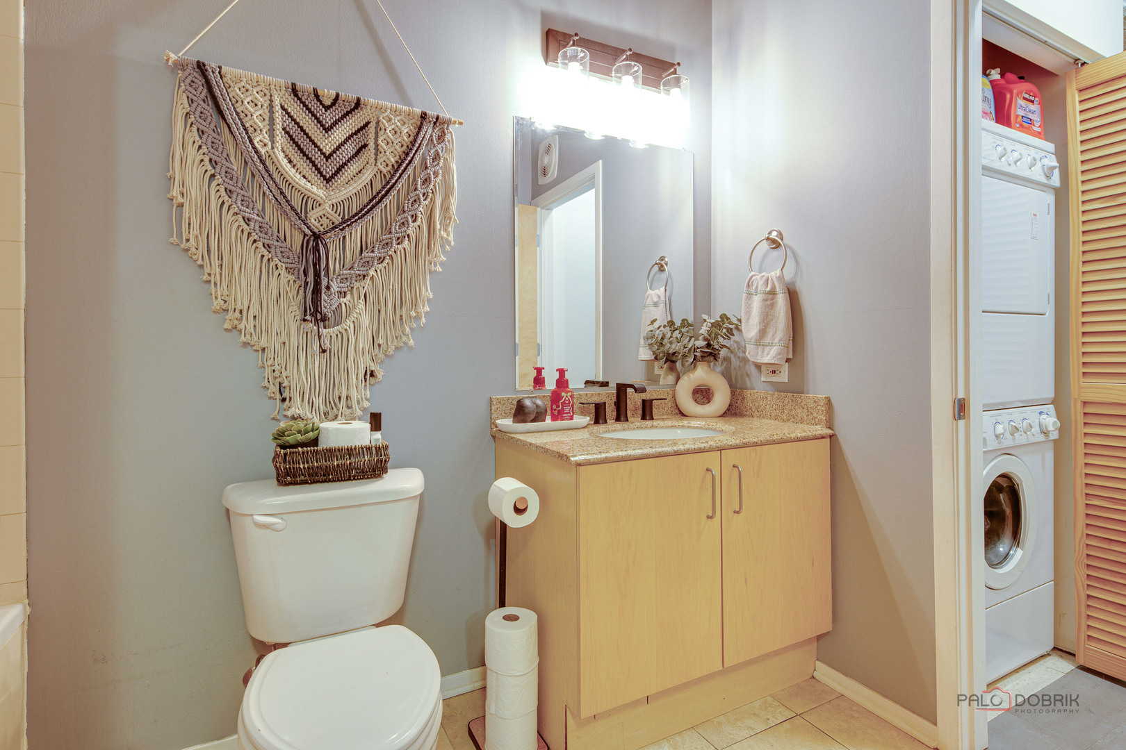 700 West Van Buren Street, Unit 1402 Chicago, IL 60607 - Photo 12 of 15 a bathroom with a toilet sink and mirror