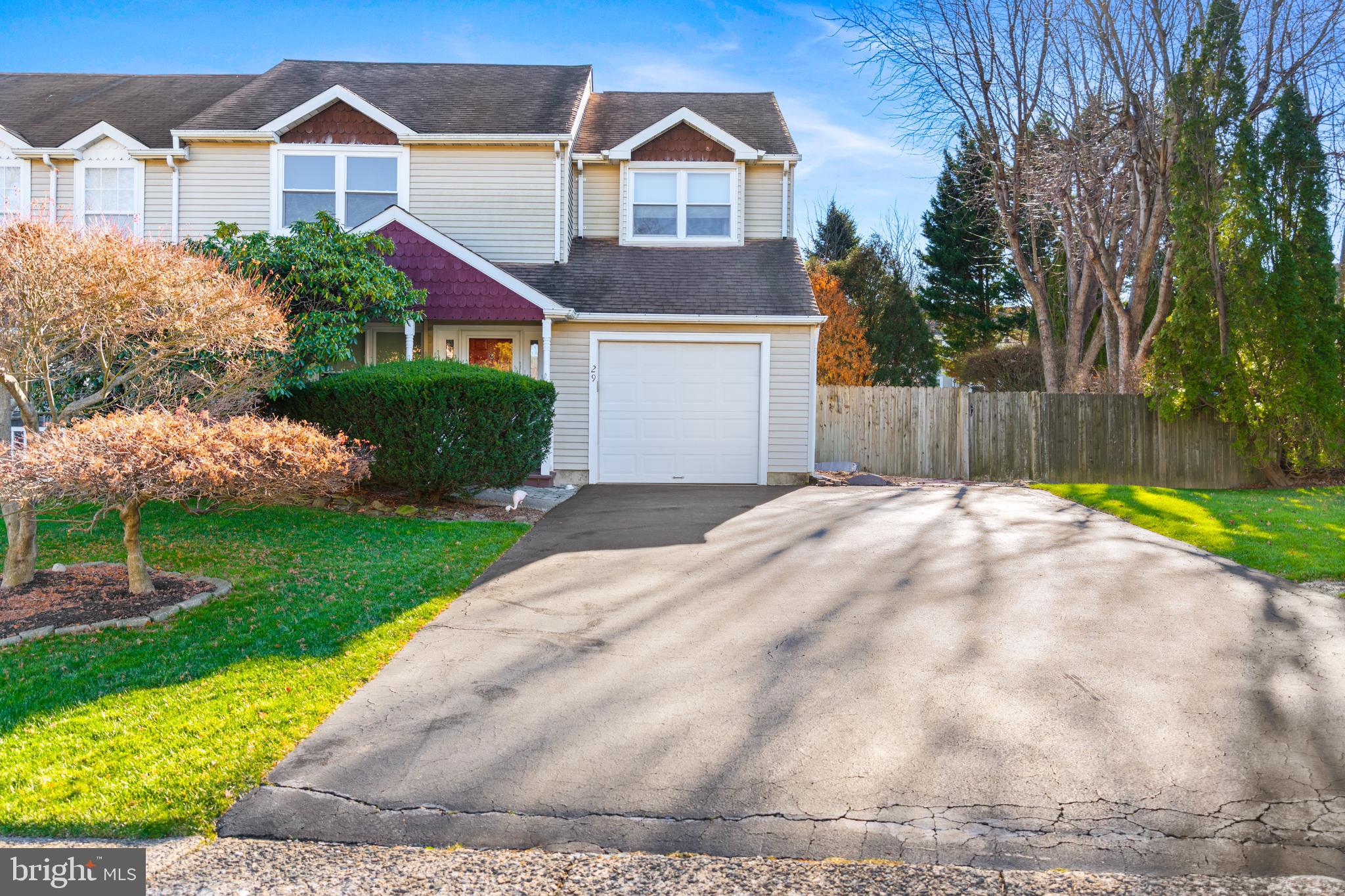 29 Tree Bark Lane Southampton, PA 18966 - Photo 12 of 50 a front view of a house with a yard and garage