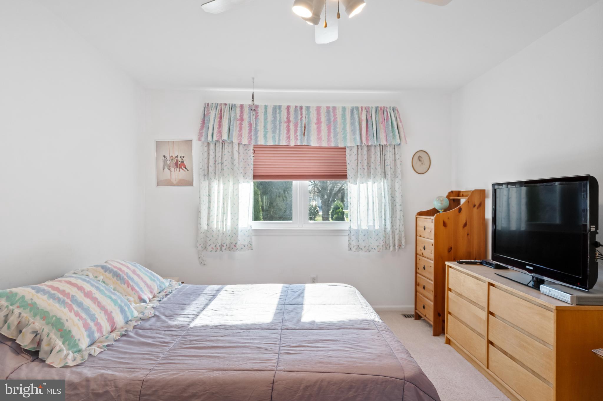 29 Tree Bark Lane Southampton, PA 18966 - Photo 25 of 50 a bedroom with a bed and flat screen tv