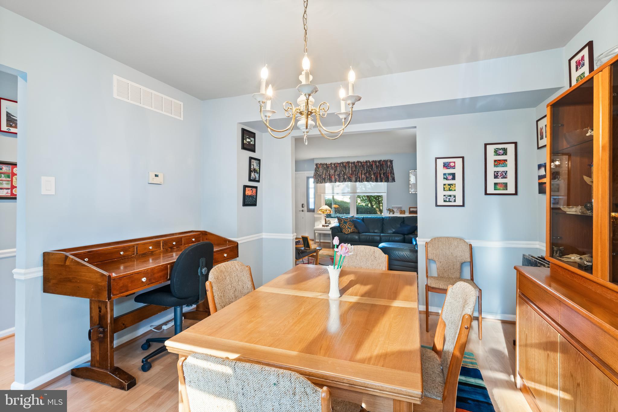 29 Tree Bark Lane Southampton, PA 18966 - Photo 31 of 50 a living room with furniture a chandelier and a flat screen tv