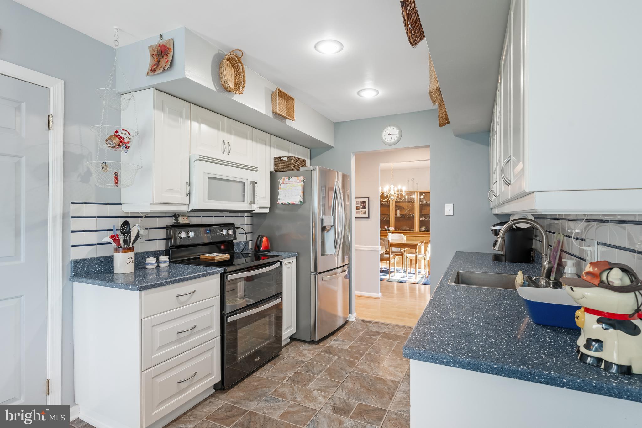 29 Tree Bark Lane Southampton, PA 18966 - Photo 39 of 50 a kitchen with stainless steel appliances granite countertop a sink stove and cabinets