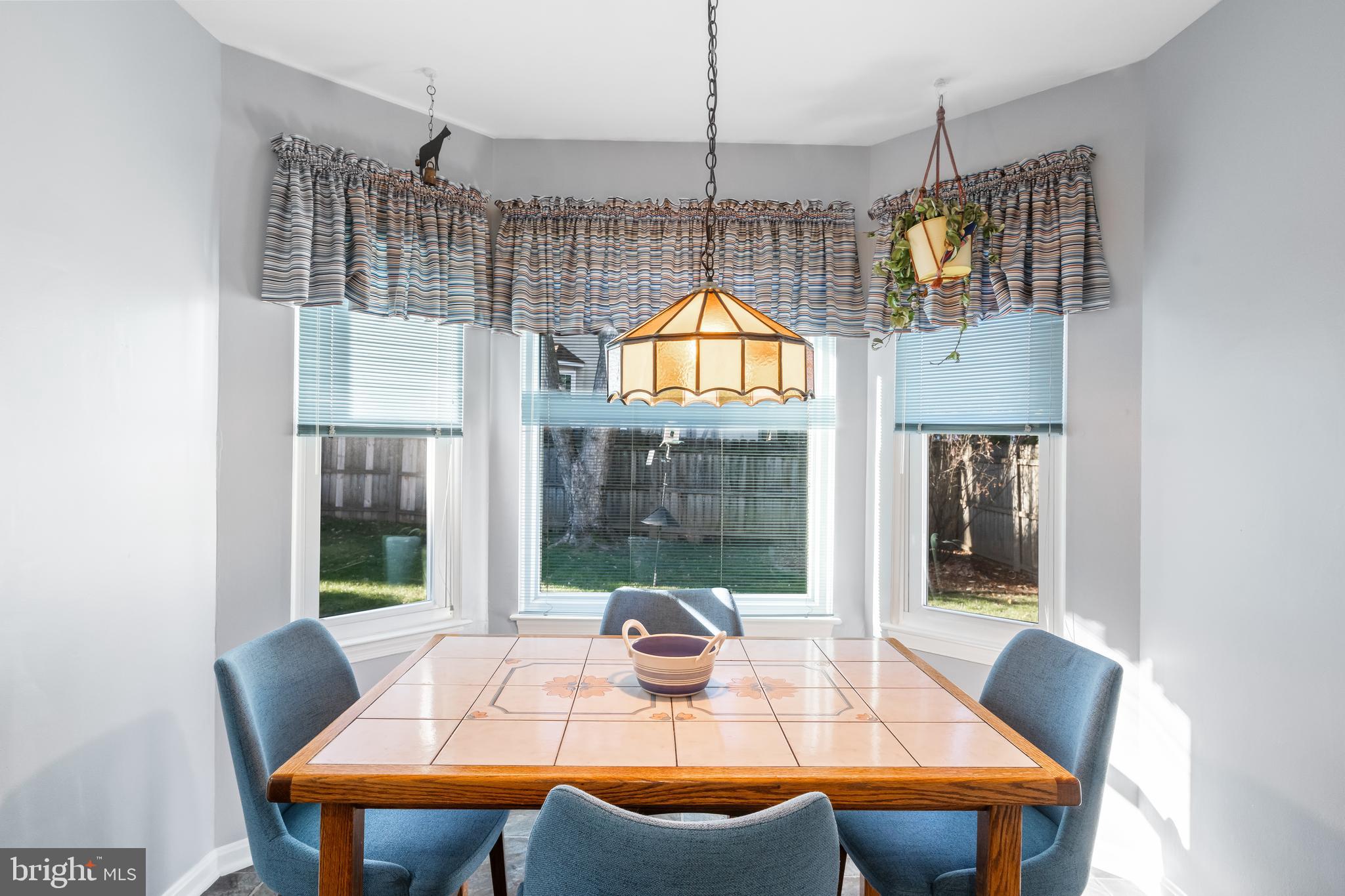 29 Tree Bark Lane Southampton, PA 18966 - Photo 40 of 50 a view of a dining room with furniture wooden floor and a chandelier