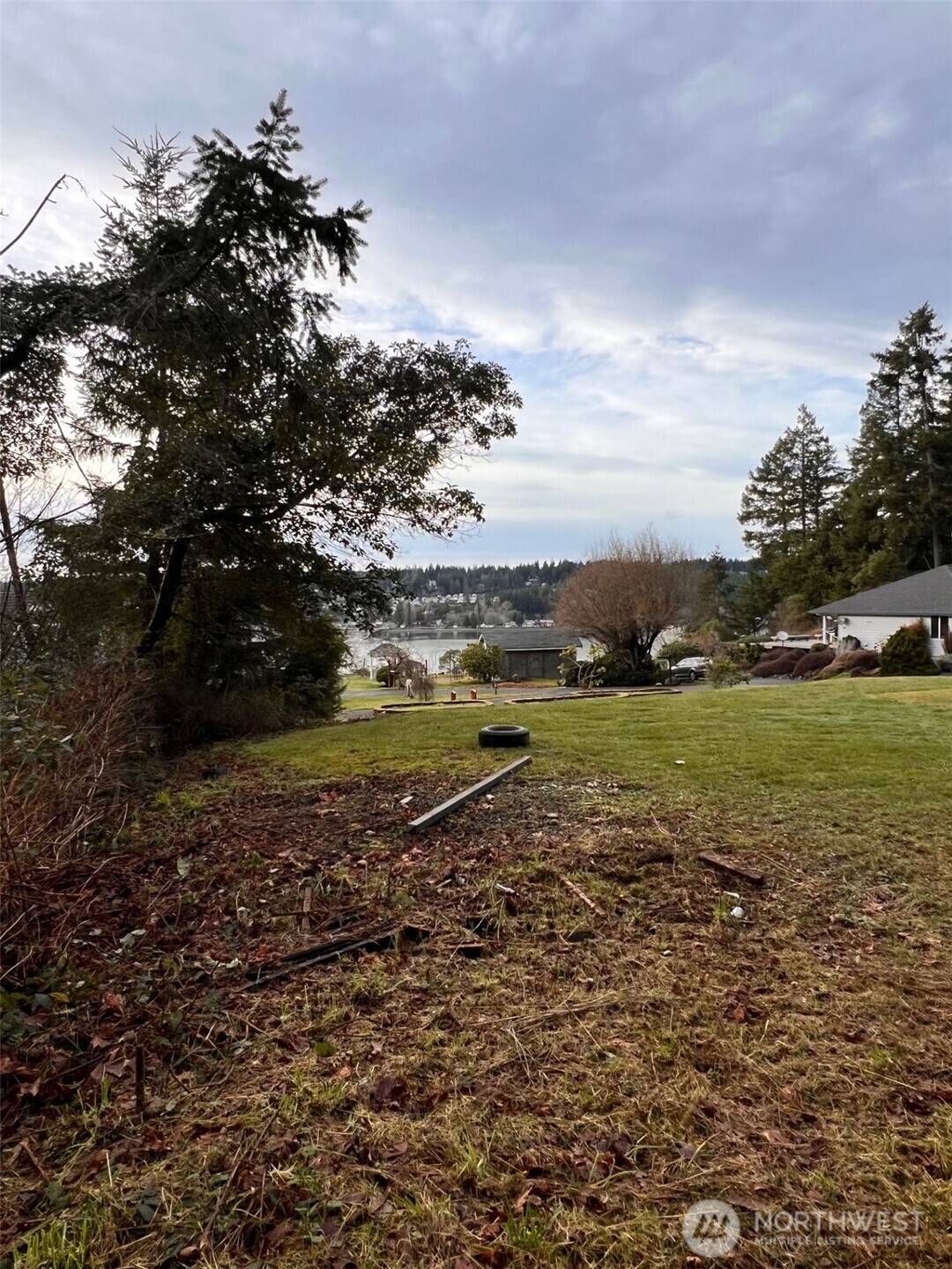 453 East Victor Road Belfair, WA 98528 - Photo 6 of 7 a view of a lake from a yard