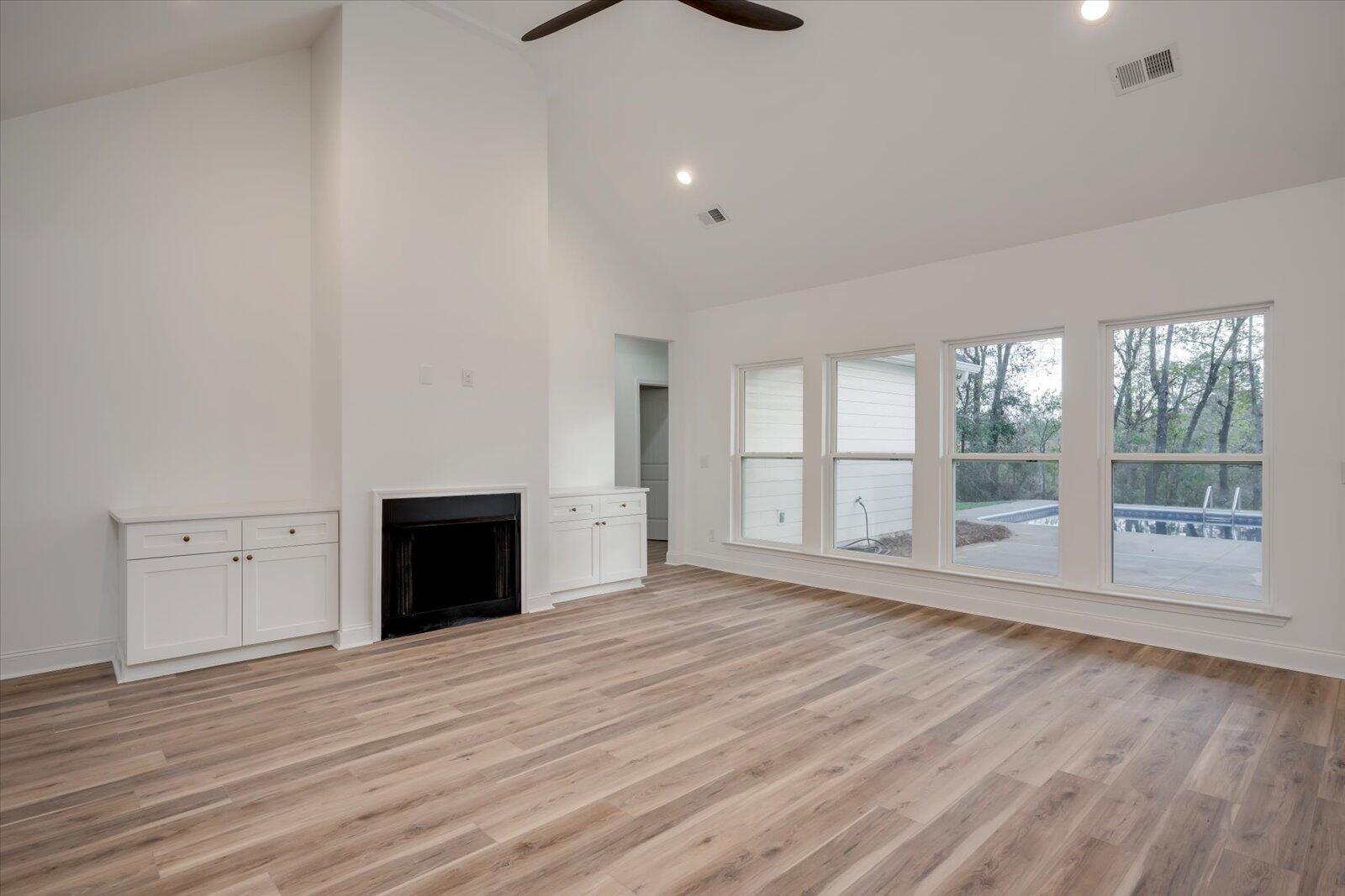 13684 Atomic Road Beech Island, SC 29842 - Photo 9 of 47 High ceilings and wood burning fireplace in living room