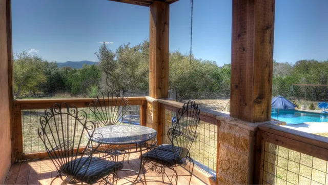 a view of a park that has large trees