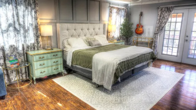 a view of a city with lush green forest