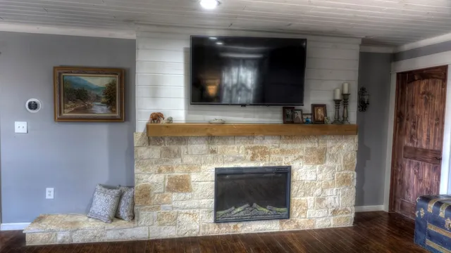 a view of a yard with a tree