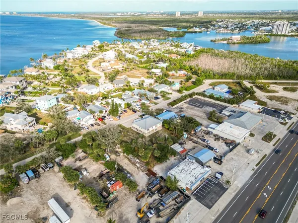 an aerial view of a houses with outdoor space