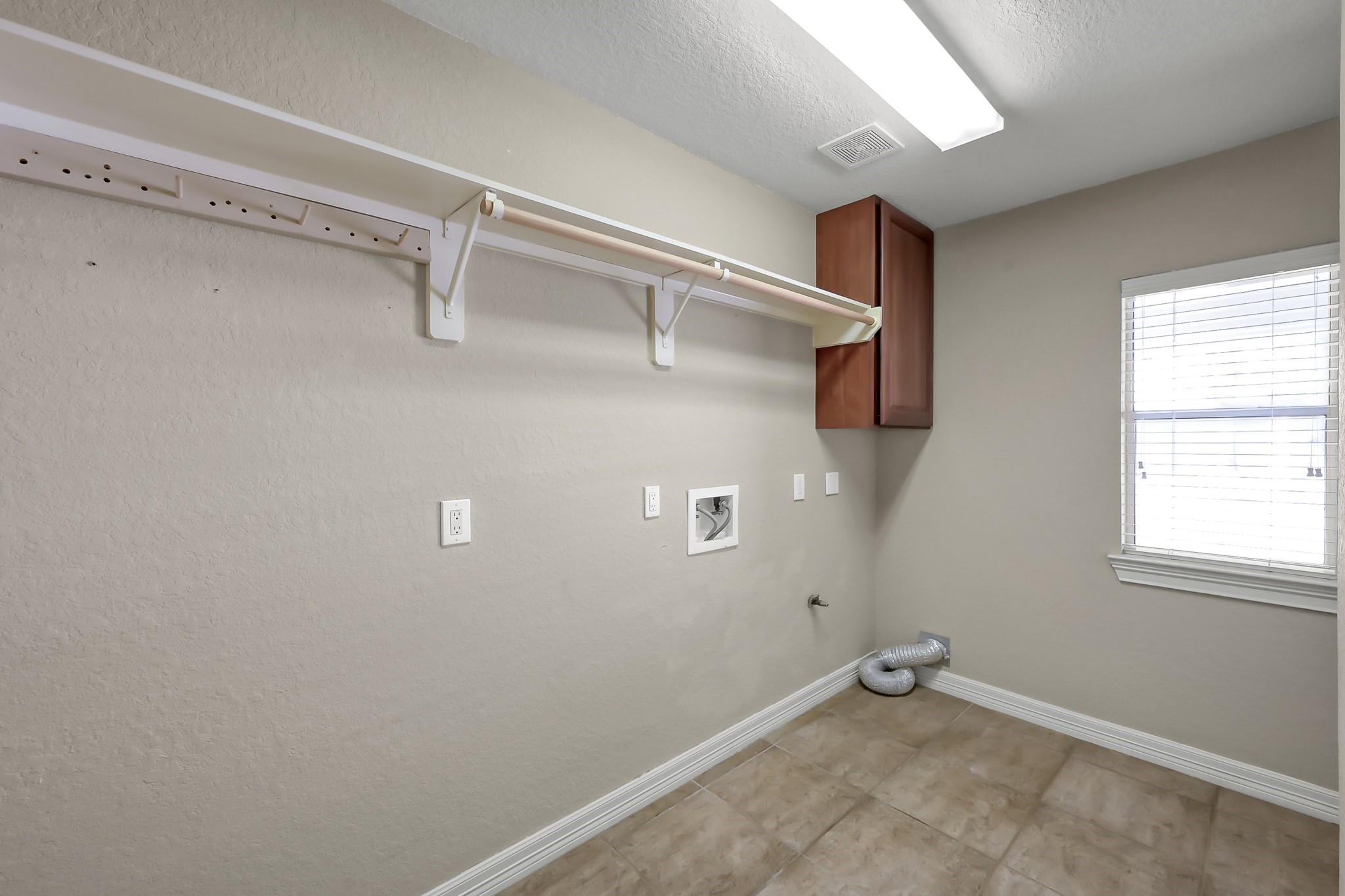 25536 Richards Road Spring, TX 77386 - Photo 33 of 44 Utility Room inside House with Gas Connections