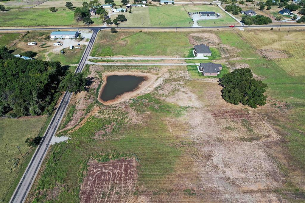 2160 County Road 4371 Decatur, TX 76234 - Photo 24 of 31 an aerial view of a house with a lake view
