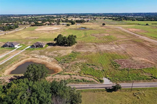 a view of a lake with a big yard