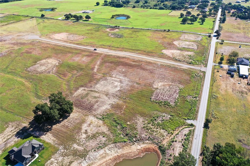 2160 County Road 4371 Decatur, TX 76234 - Photo 6 of 31 a view of a yard with an outdoor space