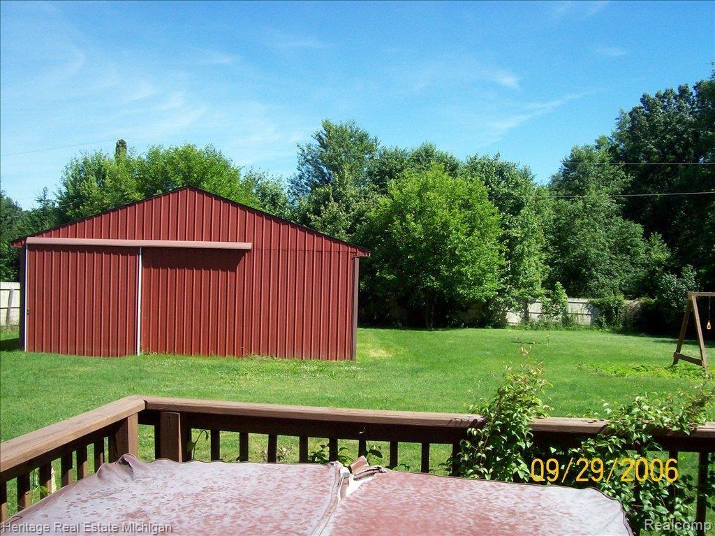 8902 West Coon Lake Road Gregory, MI 48137 - Photo 9 of 17 Deck view to Pole Barn