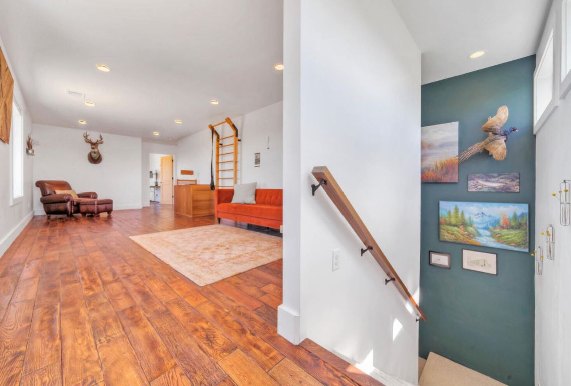 0 County Road 463 Elgin, TX 78621 - Photo 15 of 37 a living room with furniture and wooden floor