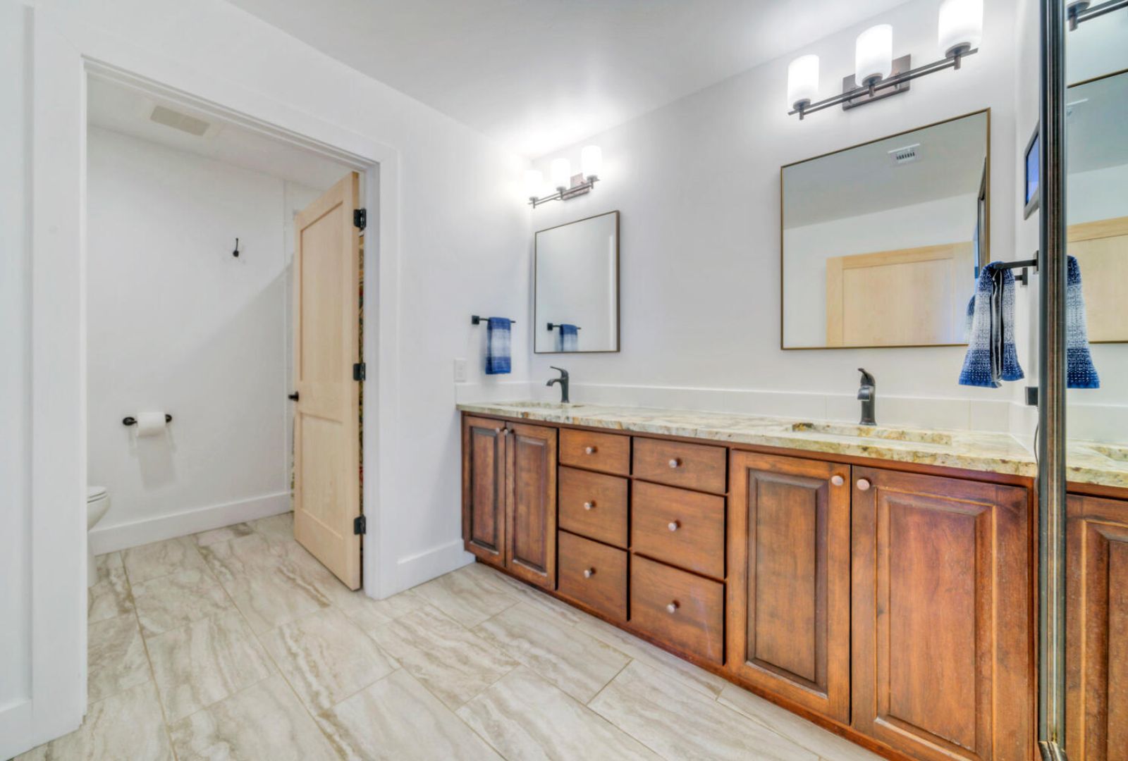 0 County Road 463 Elgin, TX 78621 - Photo 18 of 37 a spacious bathroom with double vanity sink a mirror and a shower