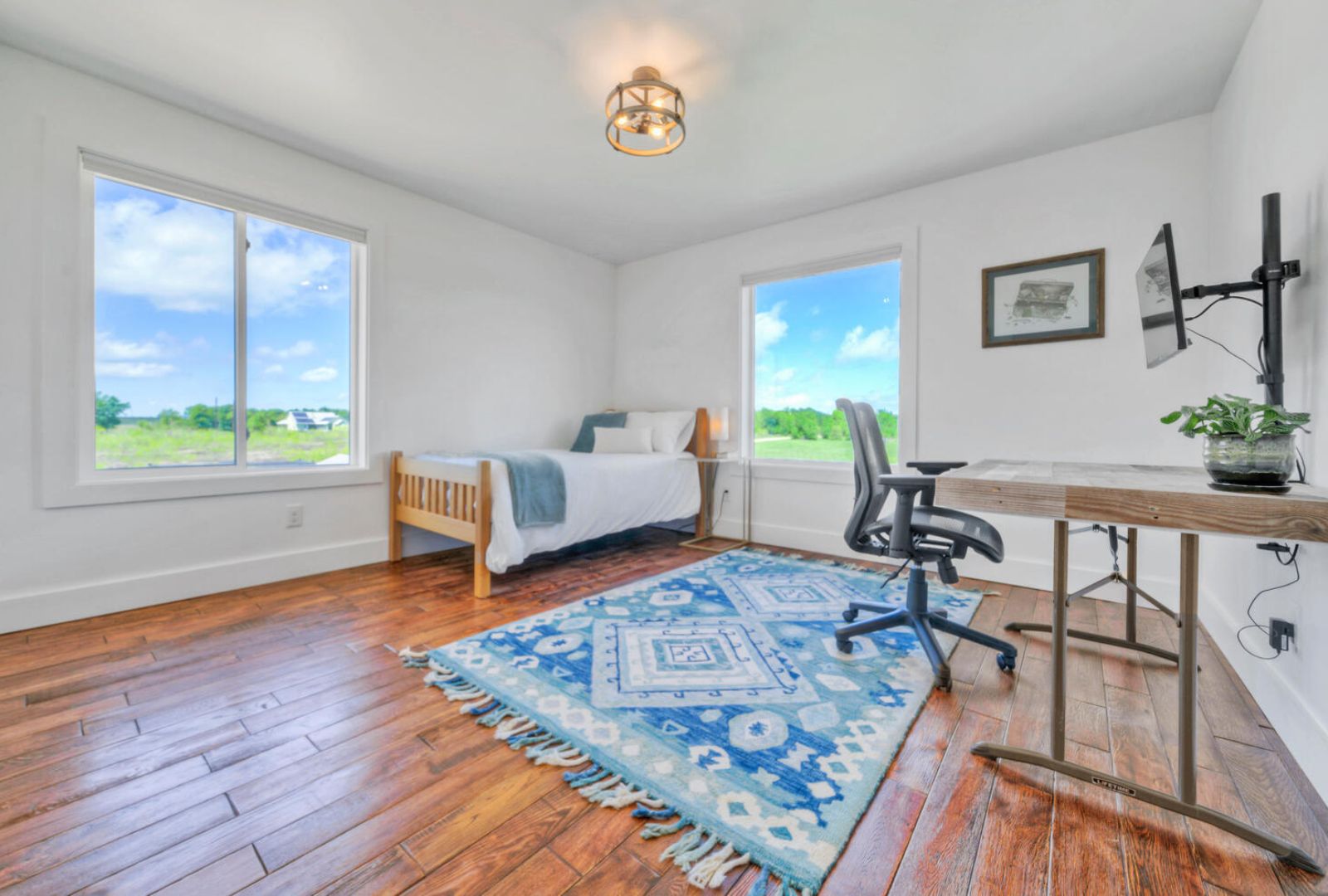 0 County Road 463 Elgin, TX 78621 - Photo 19 of 37 a living room with furniture and a wooden floor