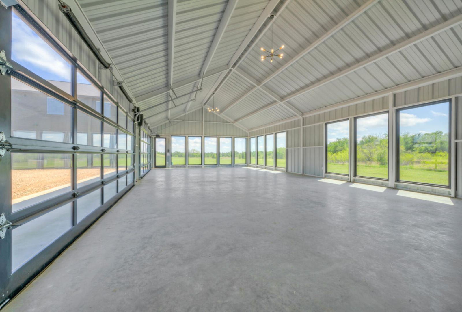0 County Road 463 Elgin, TX 78621 - Photo 21 of 37 a view of an empty room with a sliding door
