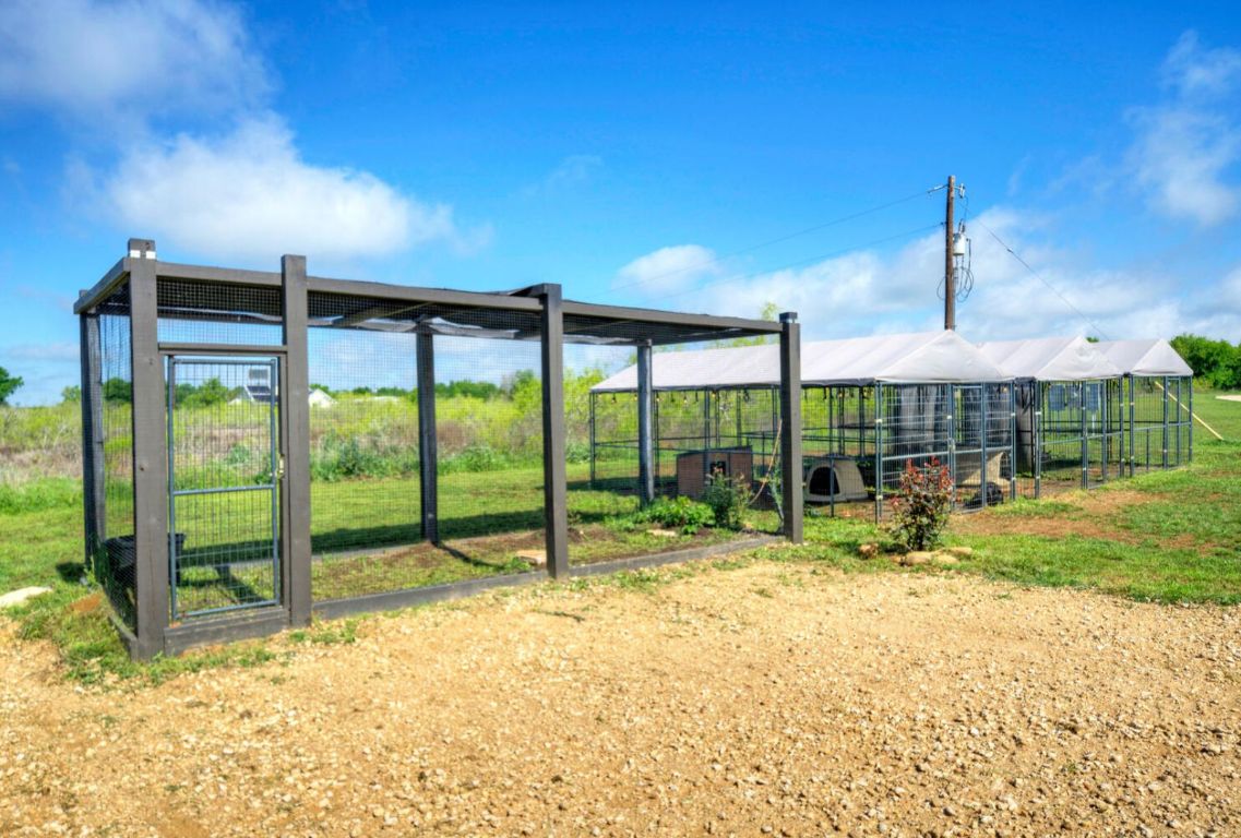 0 County Road 463 Elgin, TX 78621 - Photo 27 of 37 a backyard of a house with table and chairs