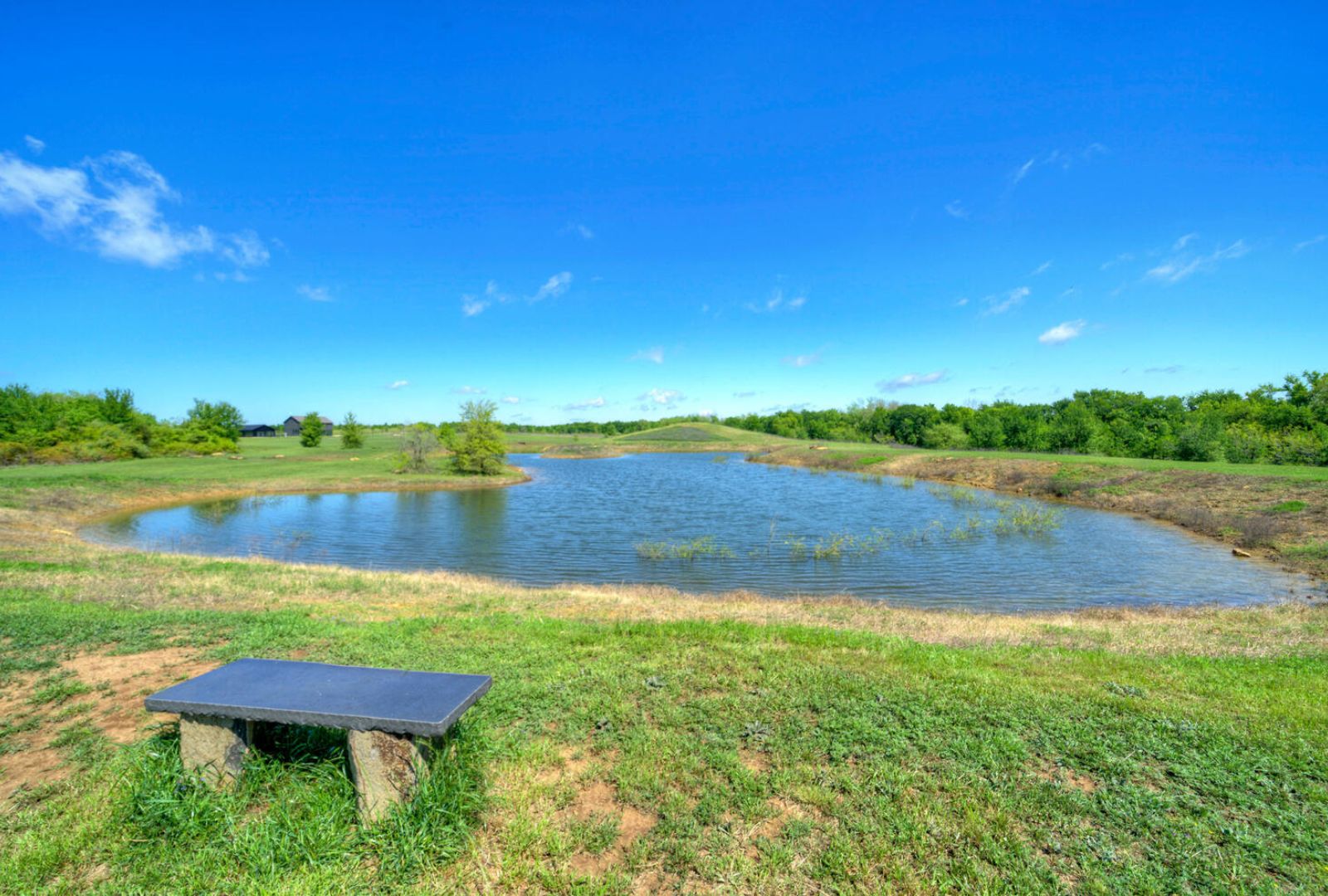 0 County Road 463 Elgin, TX 78621 - Photo 28 of 37 a view of a lake with houses in the back