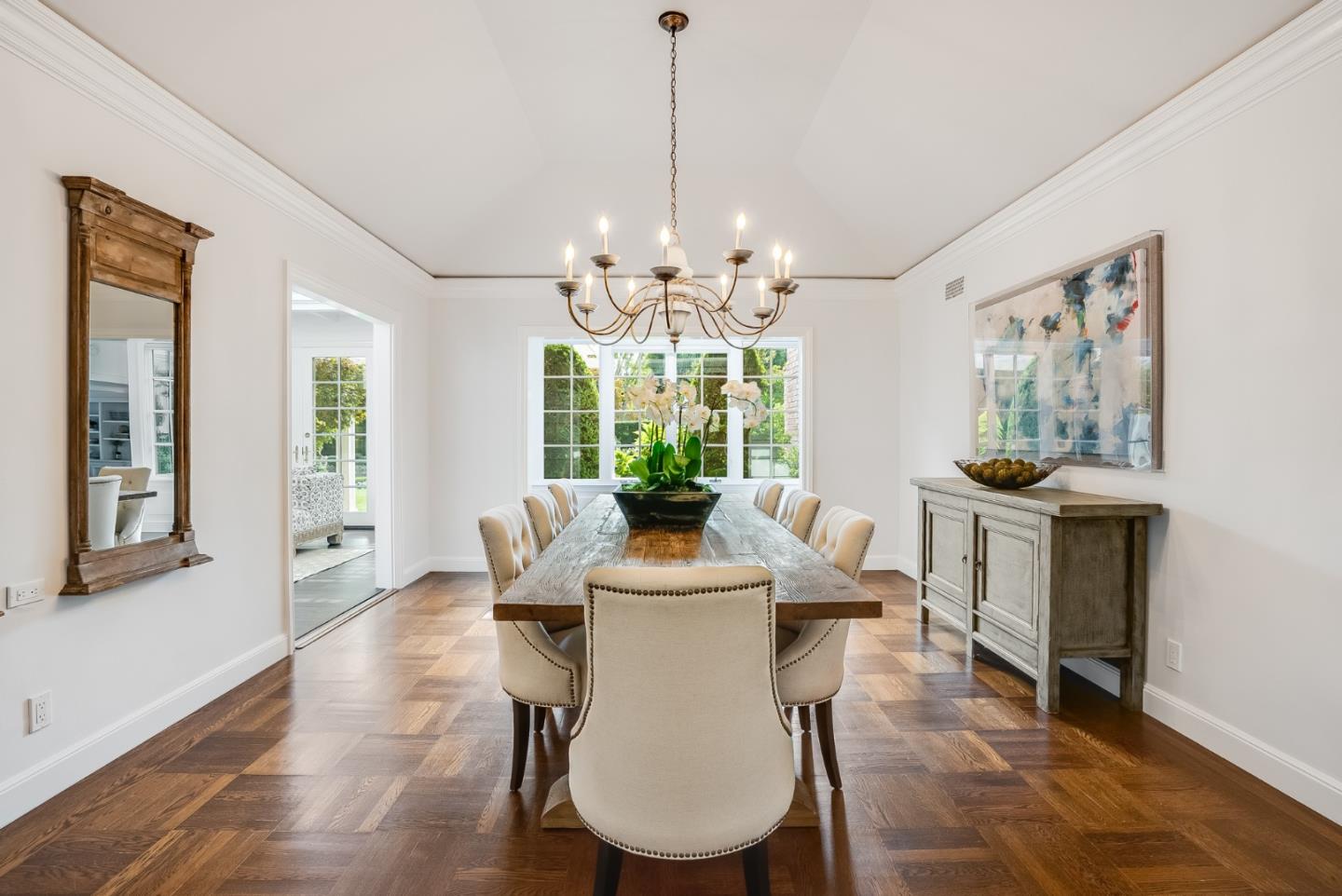76 Catalpa Drive Atherton, CA 94027 - Photo 12 of 52 a dining room with furniture a chandelier and wooden floor