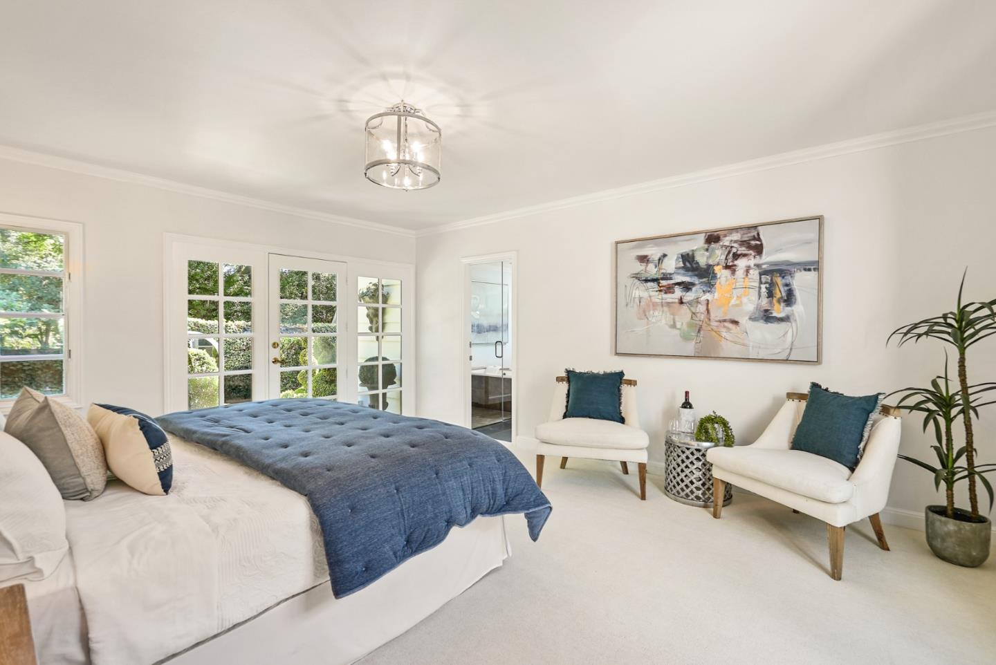 76 Catalpa Drive Atherton, CA 94027 - Photo 20 of 52 a spacious bedroom with a large bed and a window