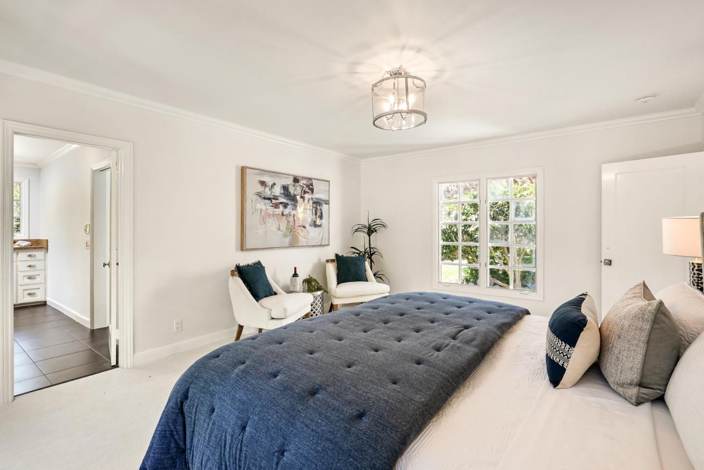 76 Catalpa Drive Atherton, CA 94027 - Photo 21 of 52 a bedroom with a large bed and a window