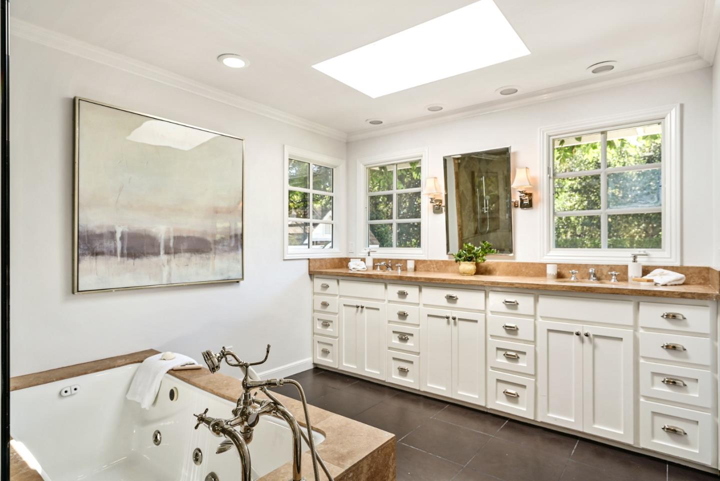76 Catalpa Drive Atherton, CA 94027 - Photo 23 of 52 a spacious bathroom with a double vanity sink a mirror and a large window