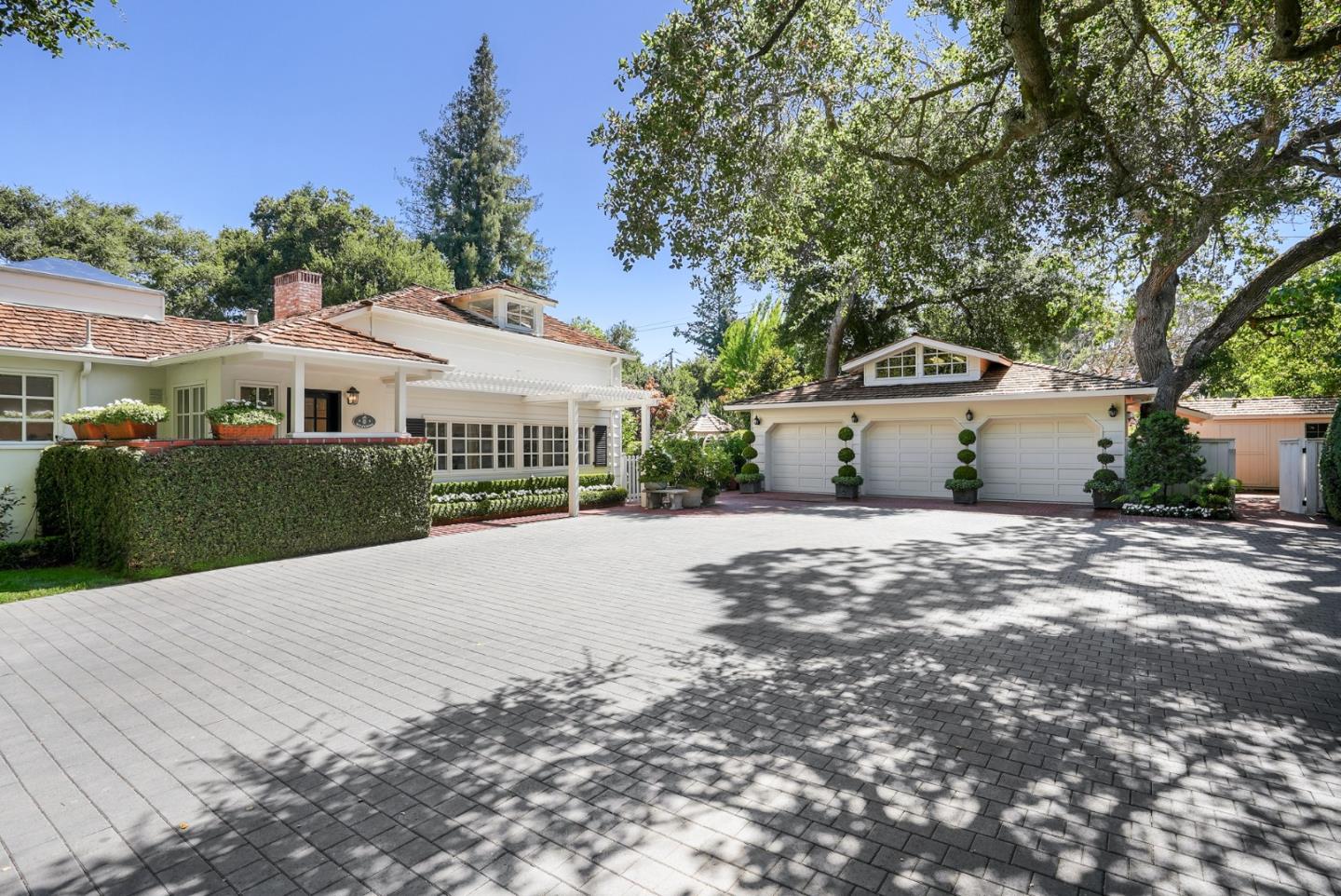 76 Catalpa Drive Atherton, CA 94027 - Photo 28 of 52 a front view of a house with a yard